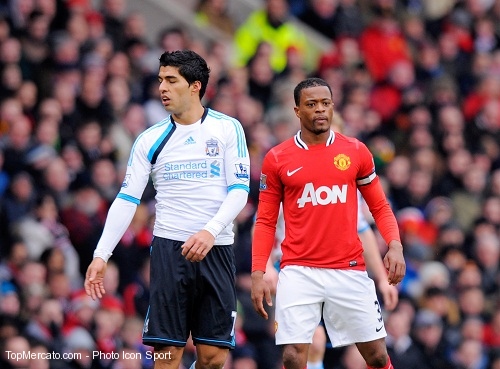 Patrice Evra et Luis Suarez