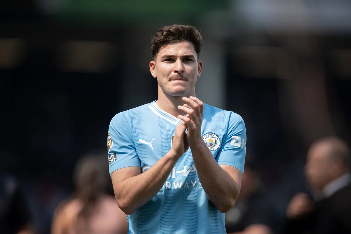Fulham FC v Manchester City – Premier League Julian Alvarez of Manchester City is applauding their fans after the Premie