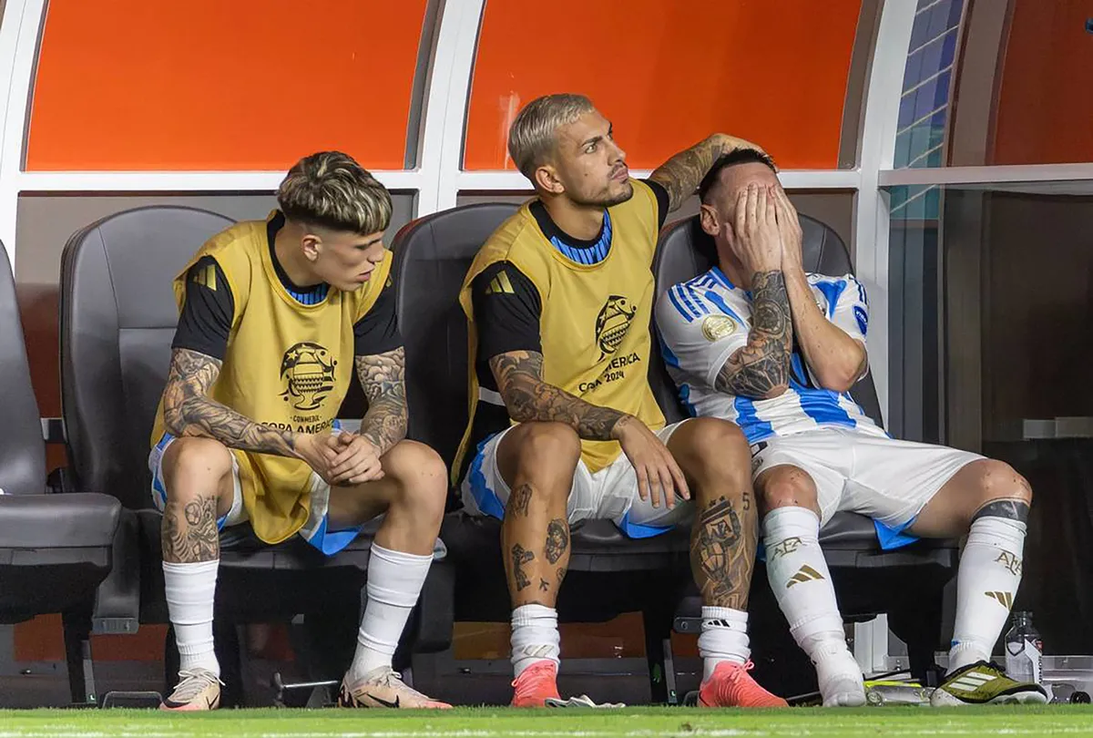 August 19, 2024: Argentina forward Lionel Messi (10) is comforted by teammate Leandro Paredes (5) after he was injured i