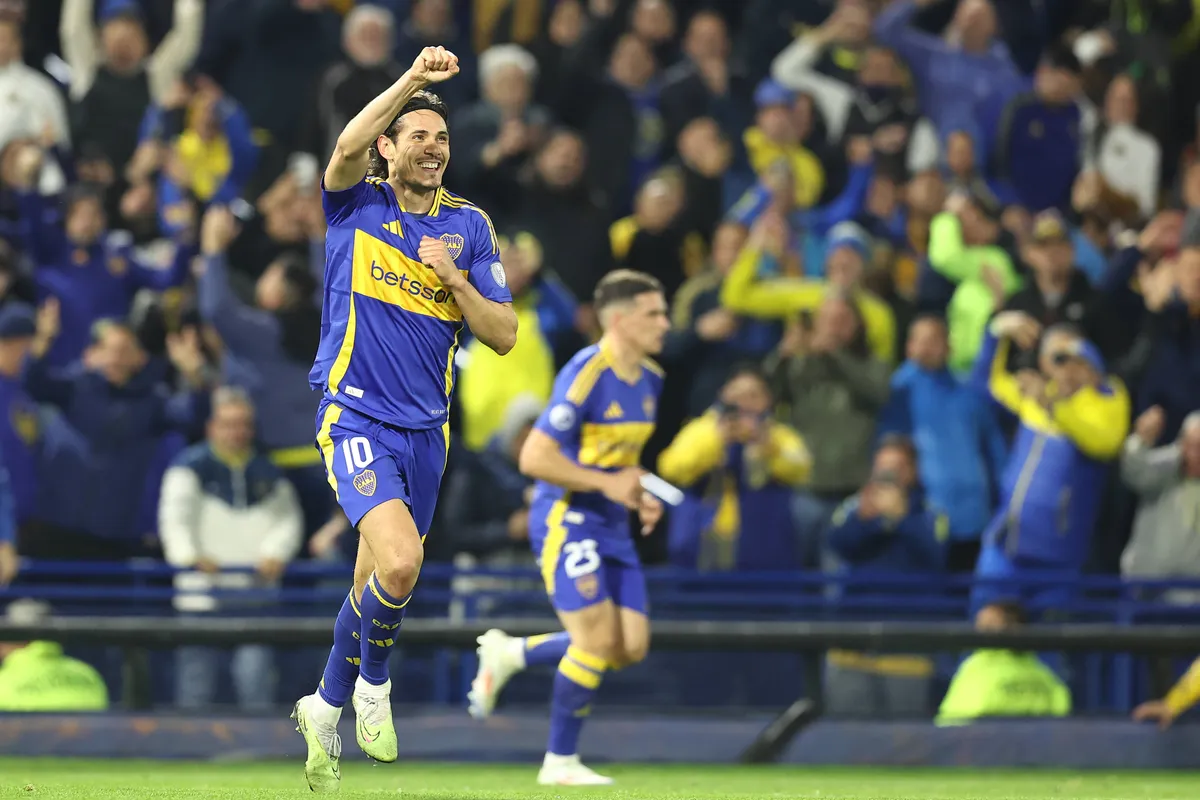 Argentina s Boca Juniors Uruguayan forward Edinson Cavani celebrates after scoring a goal against Brazil™s Cruzeiro duri