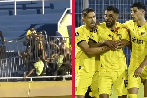 Incidentes en Rosario Central vs Peñarol: los hinchas arrojaron vallas y agredieron a un futbolista que terminó ensangrentado