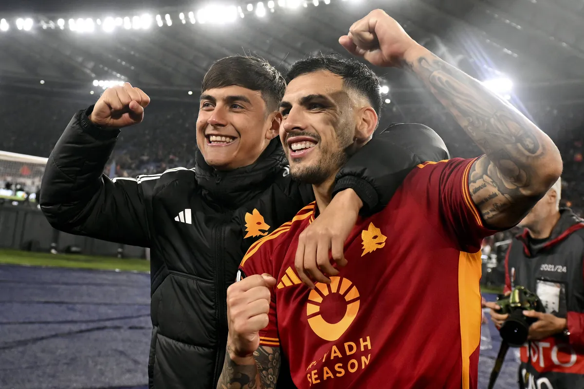 Paulo Dybala and Leandro Paredes of AS Roma celebrate at the end of the Europa League football match between AS Roma and