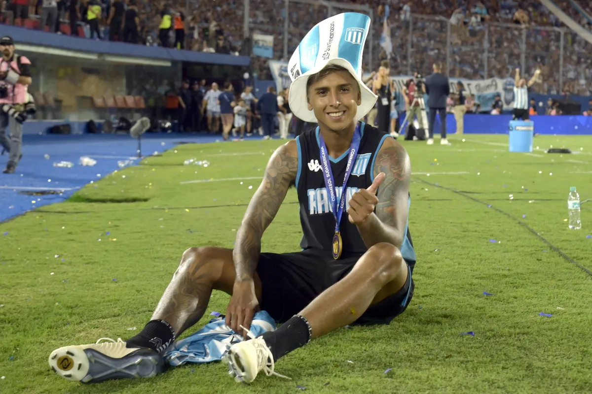Argentina s Racing Club midfielder Agustin Almendra celebrates after his team defeating Cruzeiro of Brazil during the CO