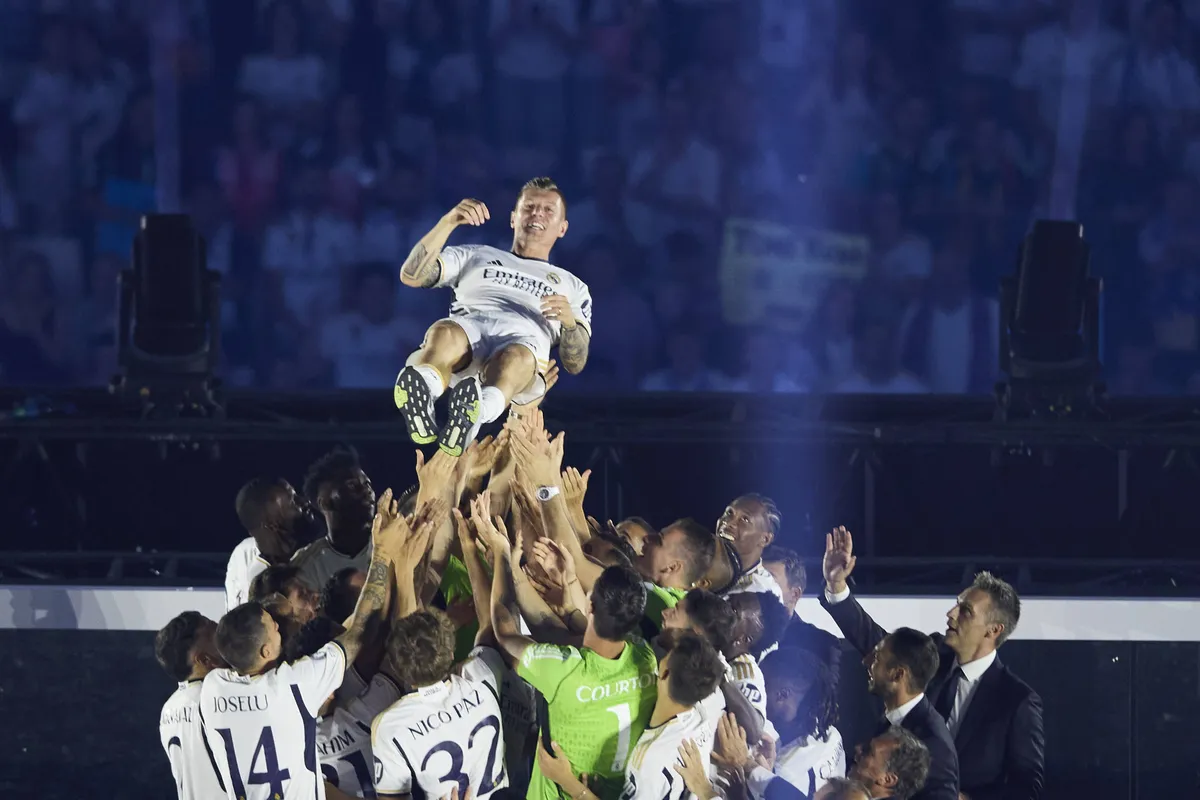 Toni Kroos (Real Madrid CF) Teammates throw in to the air at Stadium Bernabeu during Real Madrid UEFA Champions League T