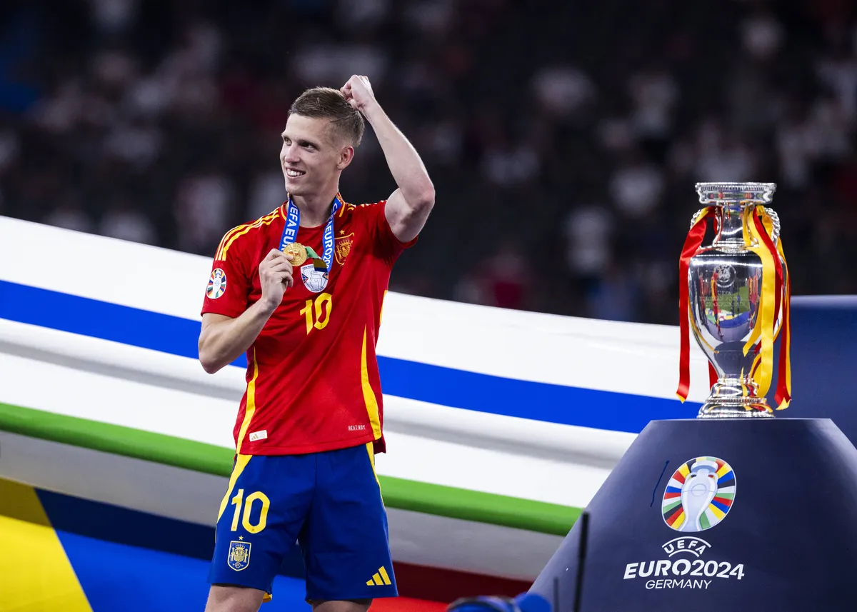 Berlin, Olympiastadion, 14.07.2024: Dani Olmo of spain celebrates at the winning ceremony during the final match at the